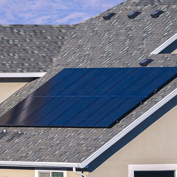 Square solar panel on a house roof